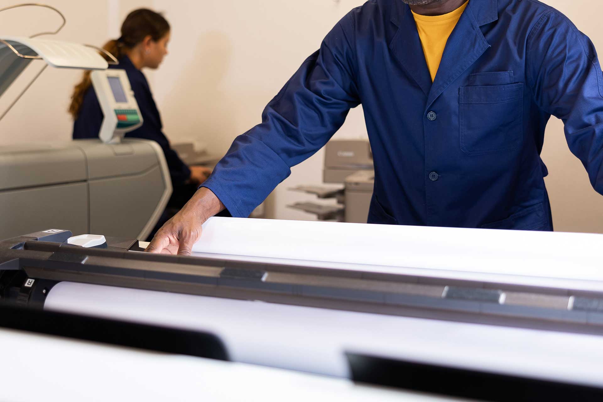 man-working-with-printer Man working with printer