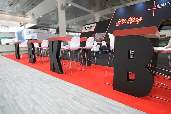 Kocher+Beck-Exhibiton-Stand-labelexpo23-600x400-4 Kocher + Beck Exhibition Stand Bespoke table LabelExpo 2023