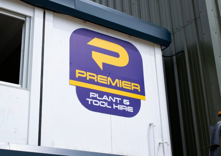 New Premier Plant branding on the side of a building